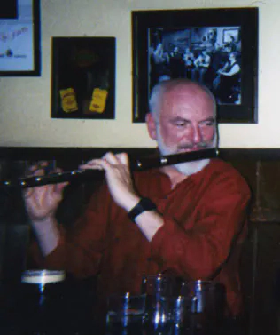 flute Matt Molloy playing flute in Westport in March 2000